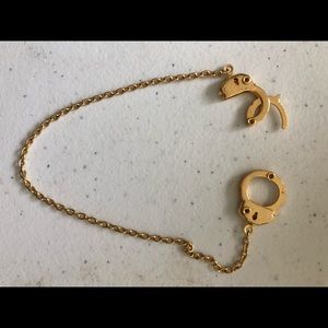 Gold handcuffed anklet